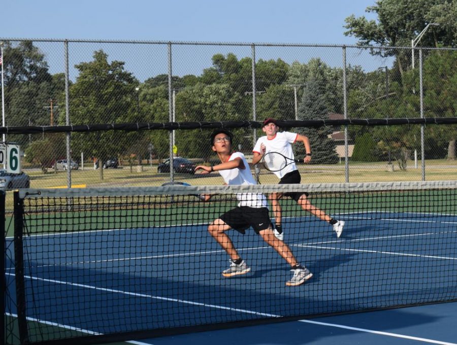 Ethan Park and Louis Wolf, juniors, get in position to return Valparaiso’s strategic hit.