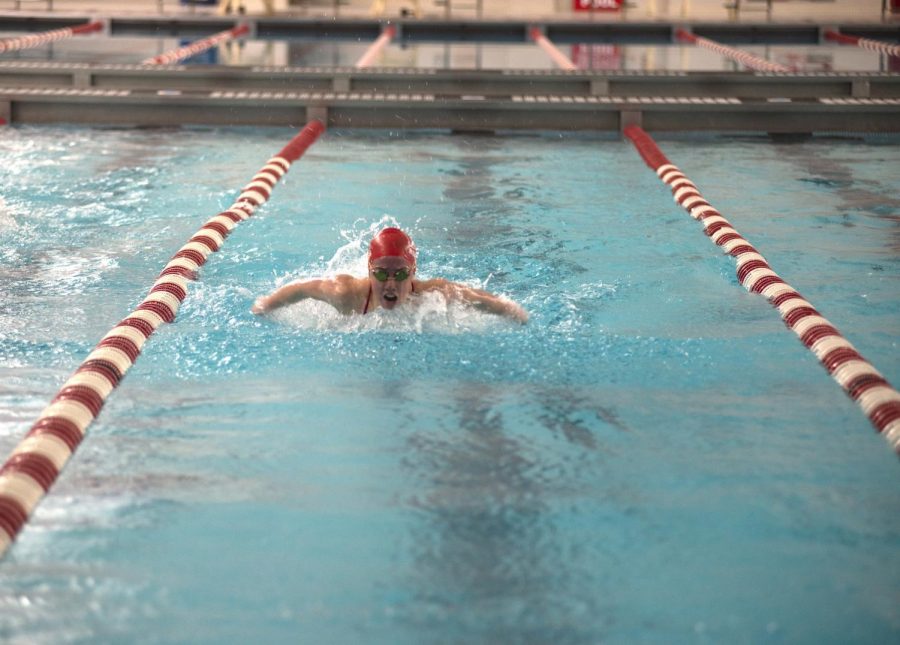 SWIMMING IN FIRST Competing in the 200m Individual medley, Hannah Robbins, junior, takes first at the NCC conference championship. “Our goals for the rest of the season are to win sectionals as a team,” Robbins said. “I also want to win the 200 Individual medley and make it to state.”

