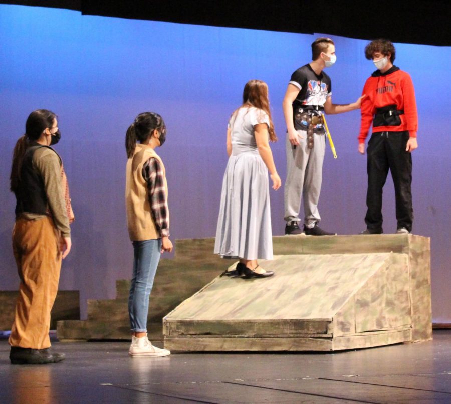 SETTING THE STAGE Acting out a scene, Joshua Decker, Delaney Craig,  freshmen, and Hayden Stanley, junior, work with each other to prepare for the upcoming spring production “Peter and The Starcatcher.” The play will be available to stream on May 7-9.