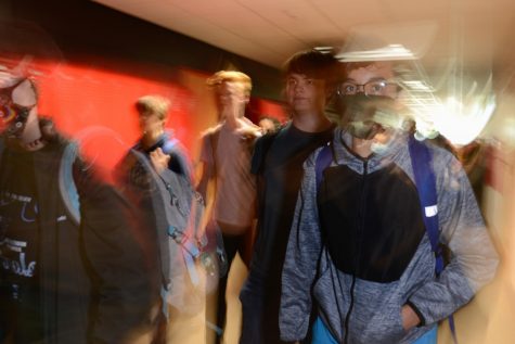 BLURRED LINES Stampeding into the hallway, students rush out of their classrooms after being dismissed to MRT.  At the start of the year, students often were lost without having previous years of experience.