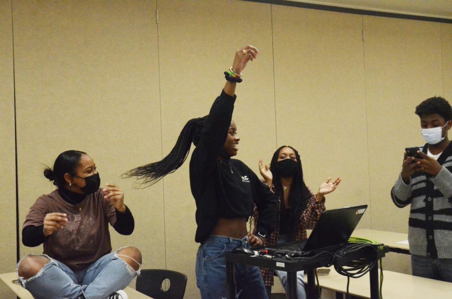 MUSIC BREAK At a BCC meeting, juniors Lauren Robinson, secretary, Tyra Wheaton, co-president and Meagan Hudson, co-president, dance together. BCC gives students the chance for proper representation; lack of representation in media and school is something many students face. 