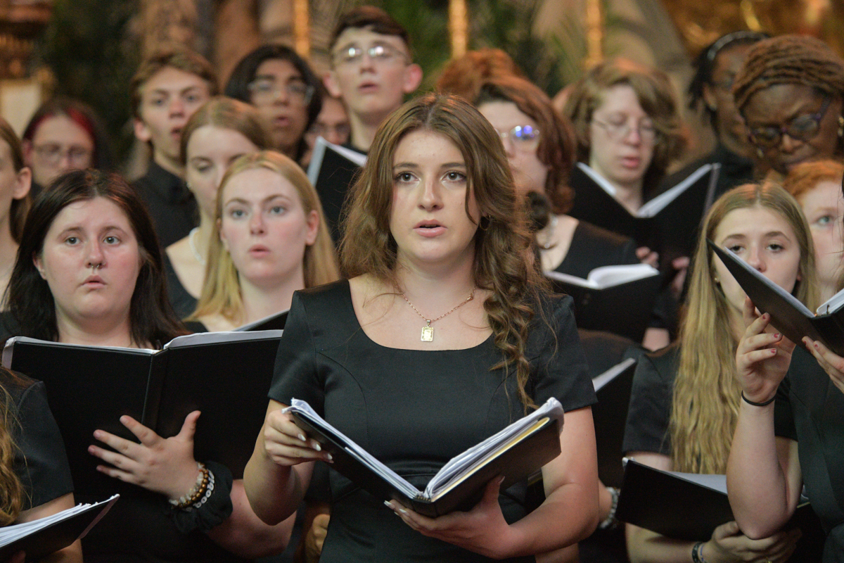 STRIKE A CHORD During a choir event at the Minoritenkirche in Vienna, Tara Gaither, senior, sings. It was the chorale’s last day in Austria, this concert being the height of their trip. “I loved learning from such talented directors and seeing all the architecture,” Tara said. 