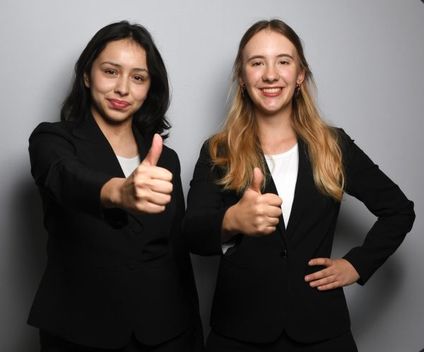 THE NEW SCHOOL ORDER Suited up, Luna Gutierrez, vice president, and Annie Fuller, president, pose in the publications studio. “Since the planning has been so much fun so far, I cannot wait for the next year. It will be the best year yet,” Annie  said. (photo by marianna young)