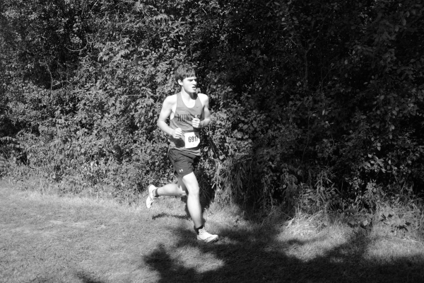 RUN FOR IT Running, senior Cavin McNulty participates in the Rudy Skorupa at Lake Central. McNulty was running 5K for Varsity. 