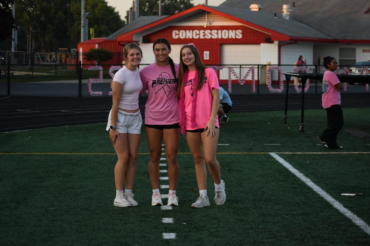 SQUAD UP Sophomores Mallorie Dondas, Cailin Robichaud and Jane Eplawy pose for a photo. The student government members organized the powderpuff game. 
