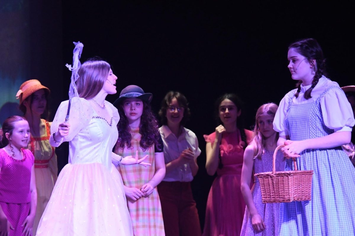 EVIL ORB Practicing the scene with the Witch’s spying orb, senior Logan Hayes and junior Emma Potchen run through the scene.